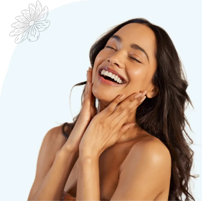 Smiling woman with bright, smooth facial skin after a soft light laser facial in Dubai
