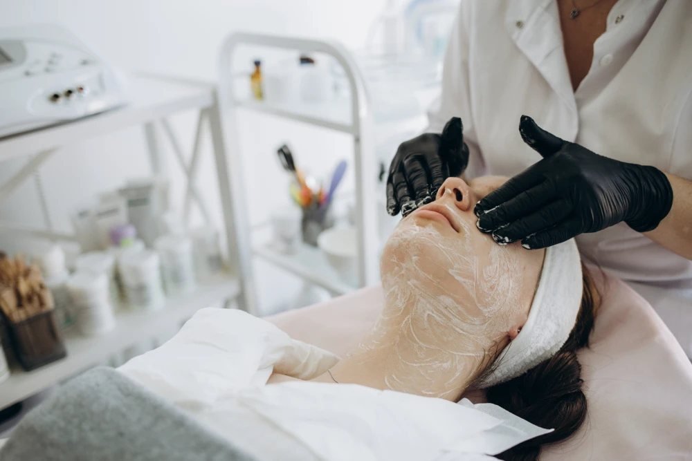 Chemical peel being applied by a skin specialist in a Dubai clinic