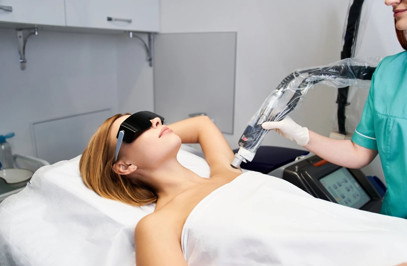 Underarm laser hair removal treatment with protective eyewear